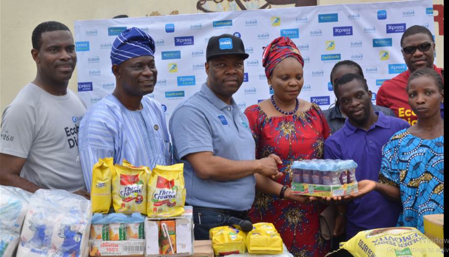 (L-R) Rotimi Morohunfola, Head Commercial Bank, Ecobank Nigeria; Ade Abatan, School Support Services, State Universal Basic Education Board (SUBEB); Patrick Akinwuntan, Managing Director, Ecobank Nigeria; Mrs. Sherefat Abike Rabiu, Head Teacher, Modupe Cole Memorial Child Care and Treatment Home and some students and Unwana ESANG, Ecobank Result Delivery Office during to visit of Ecobank Team to Modupe Cole Memorial Child Care and Treatment Home being part of activities to mark 2018 Ecobank Day in Lagos.
