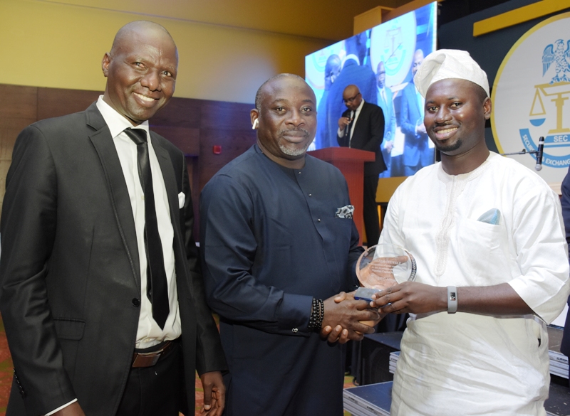 Acting Executive Commissioner Operations SEC Mr. Isyaku Tilde, Chairman, House Committee on Capital Market Hon Tajudeen Yusuf, and CEO Stanbic IBTC Asset Management, Mr. Akeem Oyewale during SEC Awards Night in Lagos at the weekend