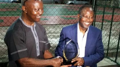 Chairman, Sky Tennis Club, Capt. Muyiwa Bajomo (left) presenting a plaque to Capt. Fola Akinkuotu at his investiture as patron of the club. Capt. Fola Akinkuotu, the Managing Director of the Nigerian Airspace Management Agency (NAMA), has been honoured as the patron of the Sky Tennis Club, Ikeja, Lagos