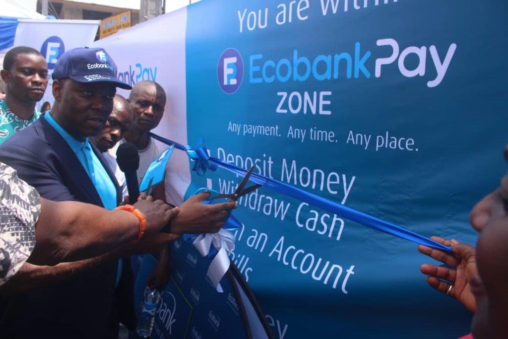 Managing Director, Ecobank Nigeria, Mr. Patrick Akinwuntan commissioning EcobankPay zone at Ariaria market, Aba, Abia state on Wednesday