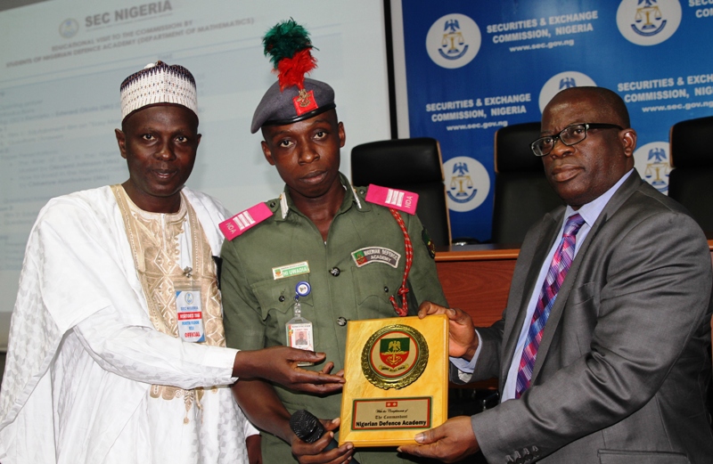  L-R,  Head of Department Mathematics, Nigerian Defence Academy, Dr Bashir Ali, Team Leader, Students of NDA,  Mr Hi Uwadia and Divisional Head Financial Inclusion, Securities and Exchange Commission Mr Bassey Achibong during the Educational Visit of the Students of Nigerian Defence Academy to Securities and Exchange Commission in Abuja yesterday  