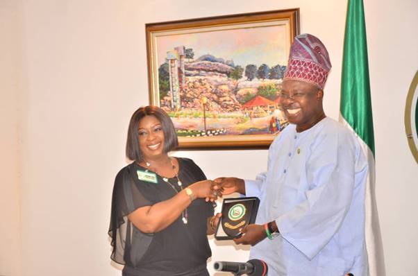 The Chairman Board of Directors of the Nigeria Deposit Insurance Corporation (NDIC), Ronke Sokefun receives a plaque from the Ogun State Governor, Ibikunle Amosun during the Board’s visit to the Governor as part of the NDIC Board Retreat in Abeokuta, Ogun State.