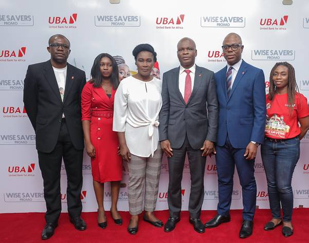 Wise Savers Promo 1: l-r:  Head, Brand Management, United Bank for Africa (UBA) Plc. Lashe Osoba; Officer,, Lagos Lottery Board, Nike Oyebamiji; Head Lagos Office, Consumer Protection Council, (CPC) Susie Onwuka; Executive Director, UBA Plc, Liadi Ayoku; Head, FMCG, UBA Plc. Isiuwe Chike; and Mass Retail/Agent Banking Manager, UBA Plc, Bolajoko Agunlejika at the 2nd Quarterly  Draw of UBA Wise Savers Promo where 20 Savings Account Holders won N1.5m  each,  in Lagos on Thursday