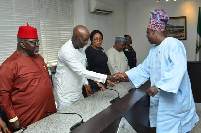 The Executive Governor of Ogun State Ibikunle Amosun in a handshake with Nigeria Deposit Insurance Corporation (NDIC) Executive Director (Operations) Prince Aghatise Erediauwa (2nd left) as he welcomes the members of the NDIC Board led by the Chairman Mrs Ronke Sokefun (2nd right) along with NDIC MD/CE, Umaru Ibrahim, NDIC Executive Director (Corporate Services), Hon. Mrs. Lola Abiola-Edewor and NDIC Board Director Brig. Gen. J. O. J. Okoloagu rtd.