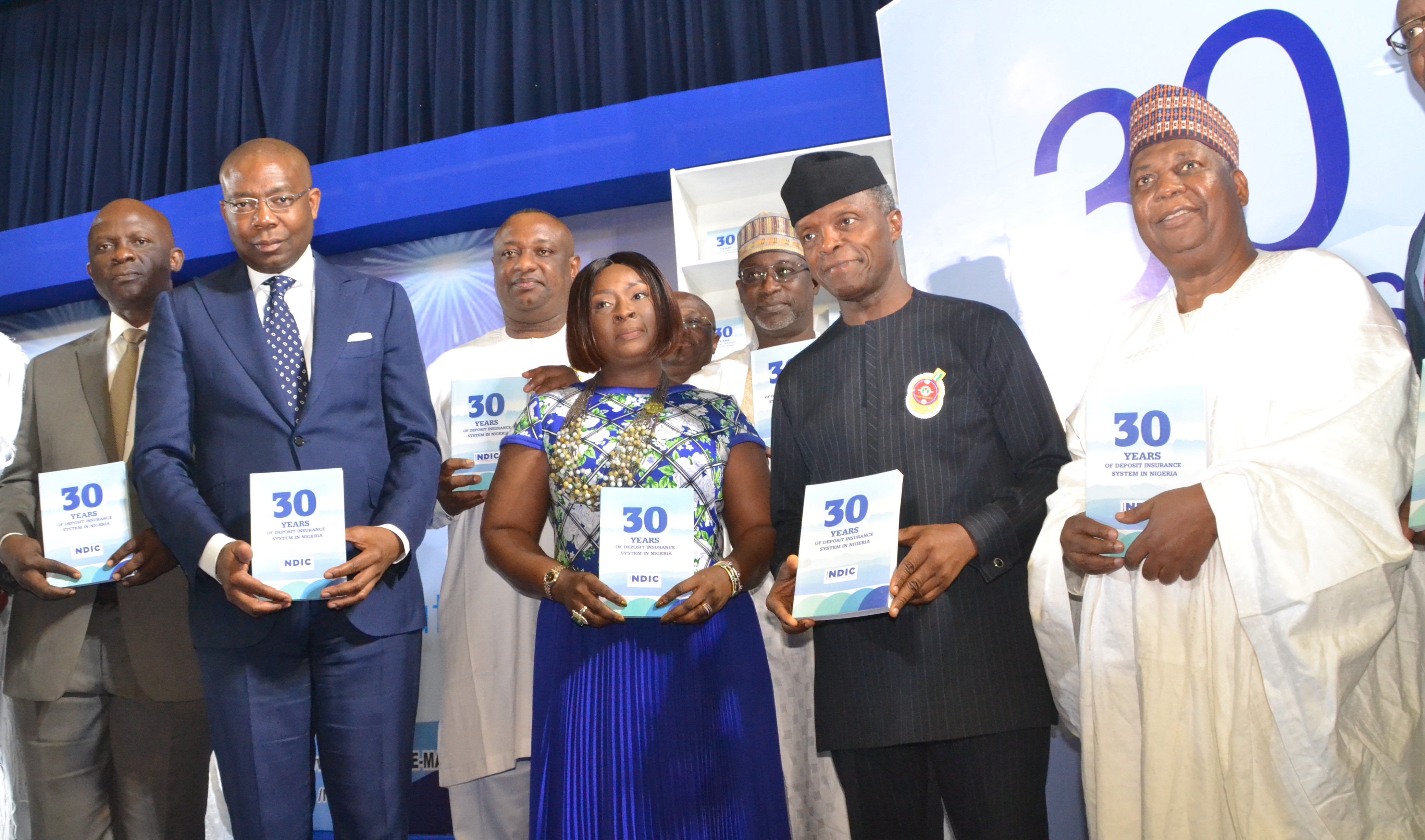 L-R: Rep. of the Rt. Hon Speaker, House of Representatives Hon. Victor Nwokolo; Guest Lecturer, Aigboje Aig-Imoukhuede; Minister of State for Niger Delta Affairs, Festus Keyamo, SAN; NDIC Board Chairman, Ronke Sokefun; Minister of Water Resources, Engr. Suleiman H. Adamu; Vice President, Prof. Yemi Osibanjo, and NDIC MD/CE Umaru Ibrahim, mni, FCIB, at the Nigeria Deposit Insurance Corporation (NDIC) 30th Anniversary Lecture and Presentation of the Book: 30 Years of Deposit Insurance System in Nigeria yesterday in Abuja 