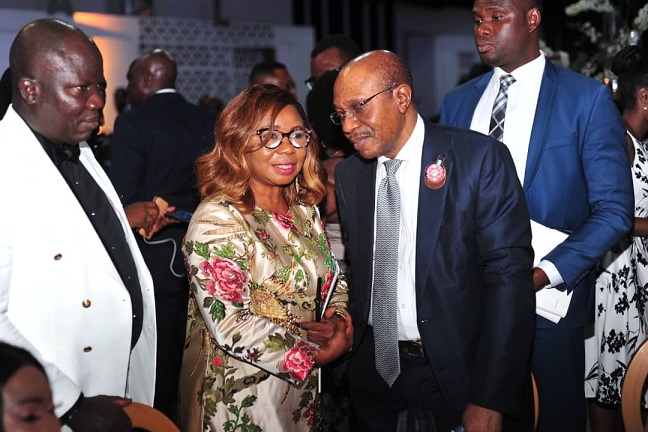 Left to Right: Registrar/Chief Executive , Chartered Institute of Bankers of Nigeria (CIBN) Mr. Oluseye David Awojobi, Acting Director General, Securities and Exchange Commission, Ms. Mary Uduk and Governor, Central Bank of Nigeria, Mr. Godwin Emefiele during the 54th Bankers Dinner held in Lagos, Weekend