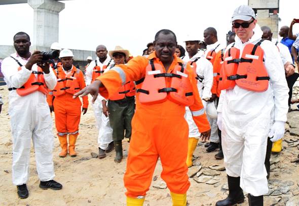 L-R: The Ambassador of The Netherlands to Nigeria, Mr. Harry van Dijk (right); being conducted round the oil spill clean-up sites in Bodo, Rivers State