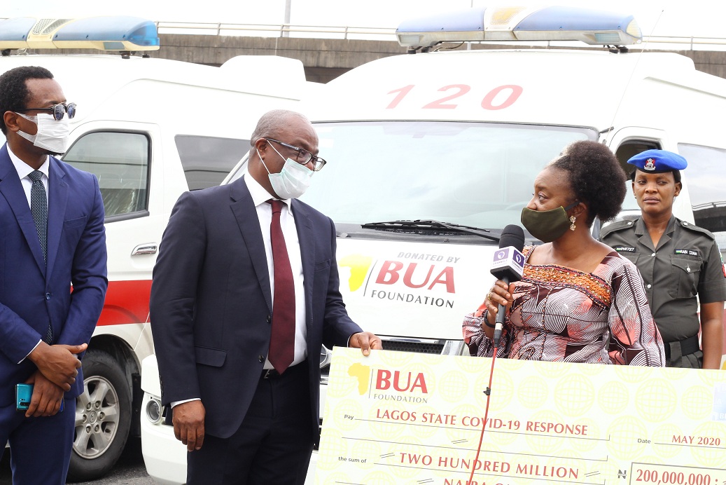 L-R: O’tega Ogra, Group Head, Corporate Communications, BUA Group, Chimaobi Madukwe, Representative of BUA Foundation and Group Chief Operating Officer, BUA Group, Ibijoke Sanwo-Olu, First Lady of Lagos State at the presentation of 5 ambulances and N200 Million cash donation to the Lagos State COVID-19 Response.