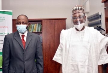L-R, Director General, Securities and Exchange Commission Mr Lamido Yuguda with Minister of Communications and Digital Economy Mr Ali Pantami during a Meeting between SEC and Minister of > Communications and Digital Economy in Abuja yesterday
