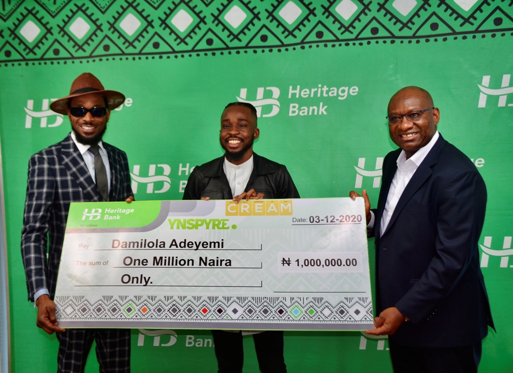 R-L: MD/CEO, Heritage Bank Plc, Ifie Sekibo; Winner of Ynspyre Account’s N1m online giveaway competition, Damilola Adeyemi and Musician and Ynspyre Account’s Ambassaor, Daniel Oyebanjo (D'banj), during the N1million cheque presentation to the winner of an online giveaway competition to celebrate the bank’s Ynspyre Account ambassador, inspired by Heritage Bank yesterday at the bank’s head office.