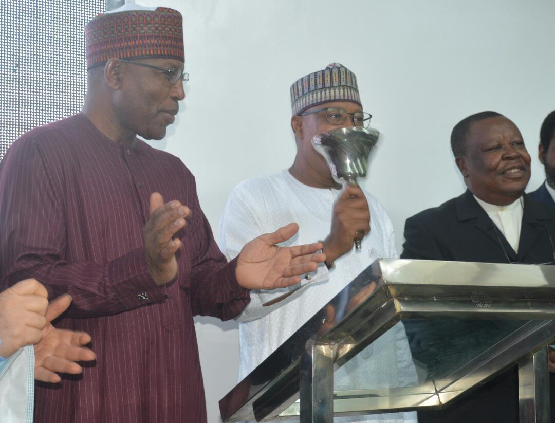 From left; Director General of the Securities and Exchange Commission, Mr. Lamido Yuguda, Chairman House of Representatives Committee on Capital Market and other Institutions, Mr. Babangida Ibrahim and Chief Onyenwechukwu Ezeagu during the ringing of the closing bell at the Lagos Commodities and Futures Exchange in Lagos.